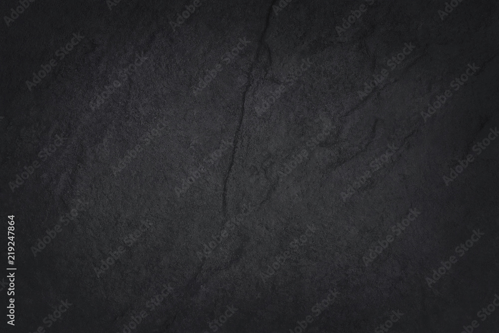 Dark grey black slate texture in natural pattern with high resolution for background and design art work. Black stone wall. Dark grey black slate texture in natural pattern with high resolution for background and design art work. Black stone wall.