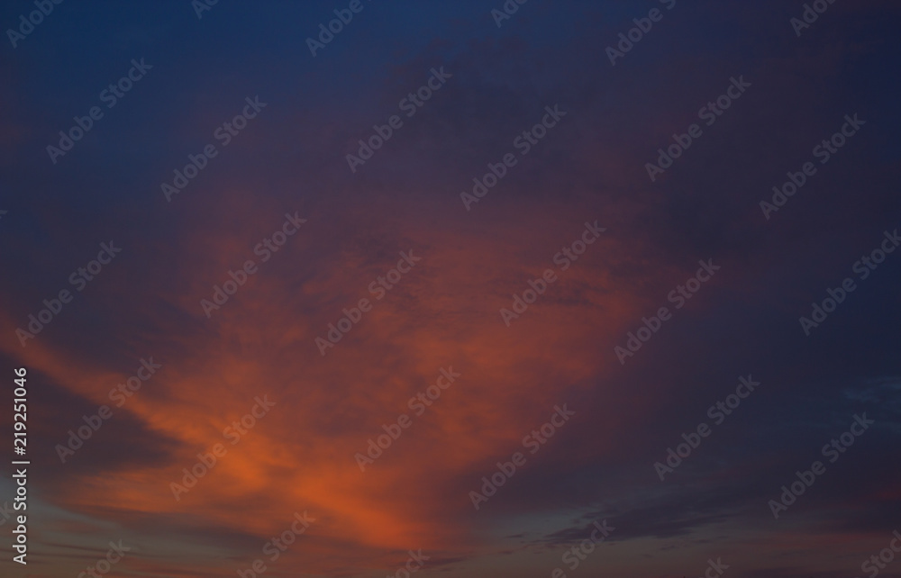 View on beautiful pink clouds in a pink blue sky.