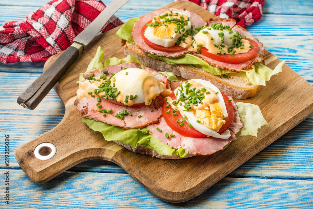 Sandwich with tomatoes, eggs and lettuce. Sandwich with tomatoes, eggs and lettuce.