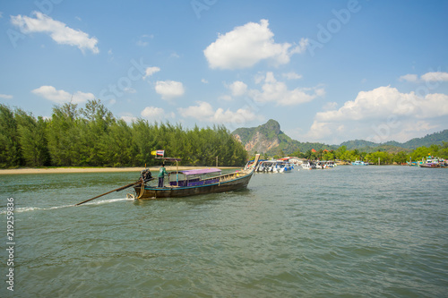 Boats and longtail boats moving to the Nopparat Thara port in Krabi Province Thailand.