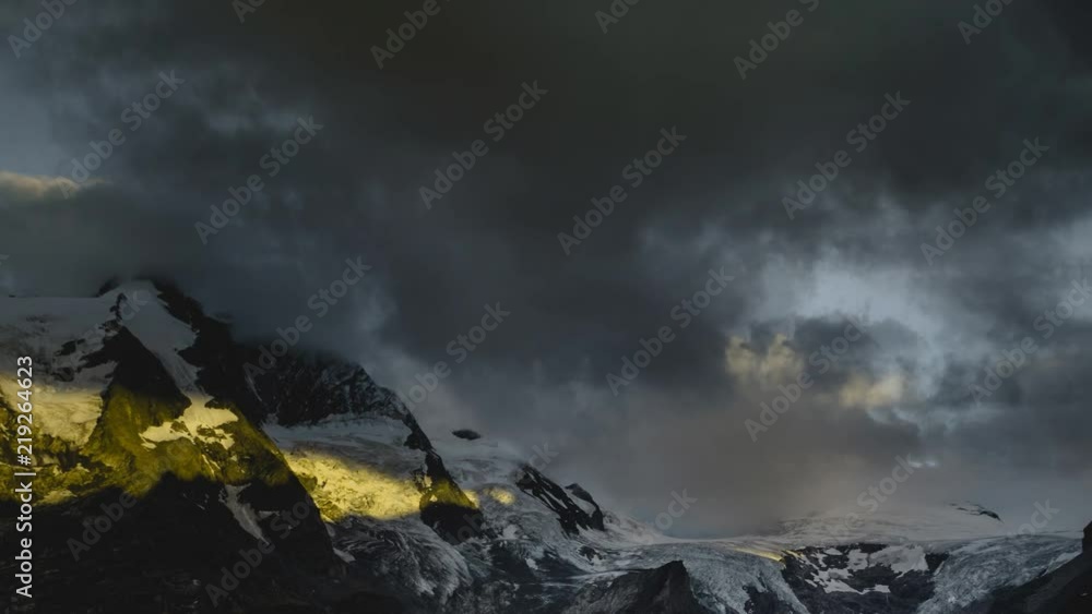 Cinemagraph time lapse of clouds rolling over high mountains Cinemagraph time lapse of clouds rolling over high mountains