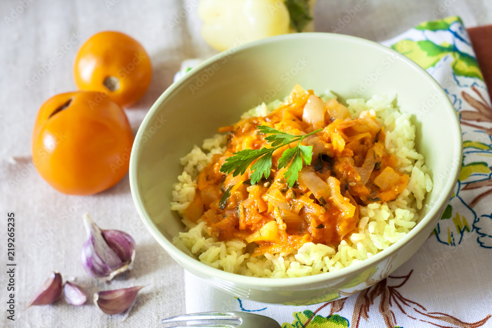 Steamed rice with stewed vegetables and turmeric