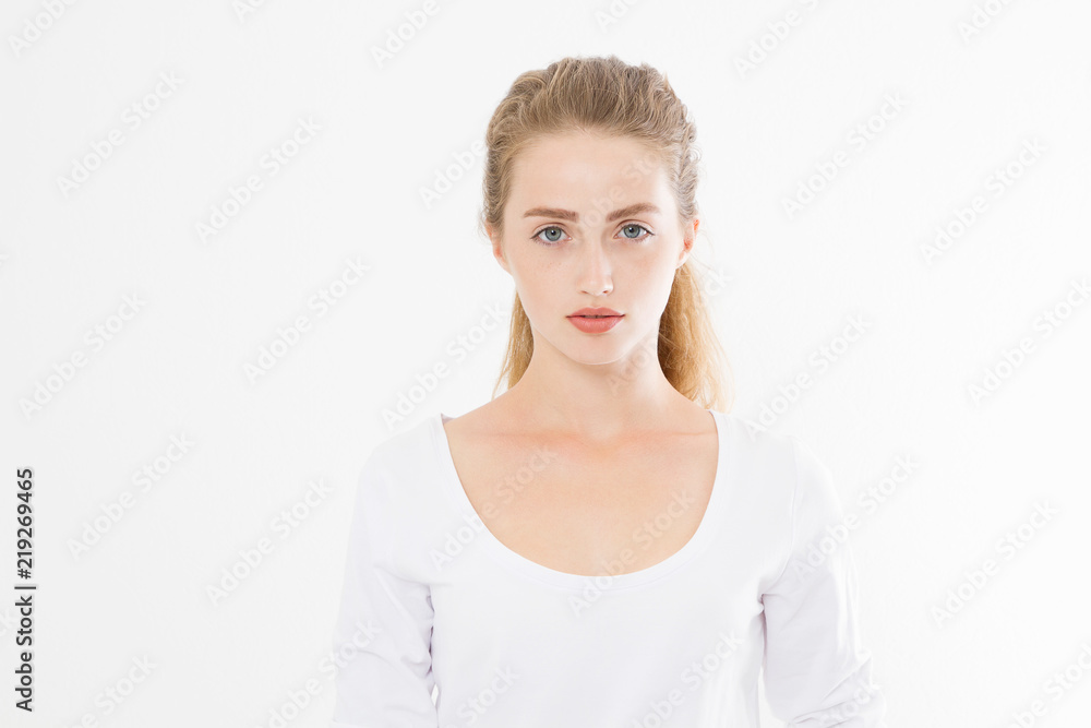 Beautiful caucasian woman in blank t shirt isolated on white background. Perfect Skin care and young female face. Copy space Beautiful caucasian woman in blank t shirt isolated on white background. Perfect Skin care and young female face. Copy space