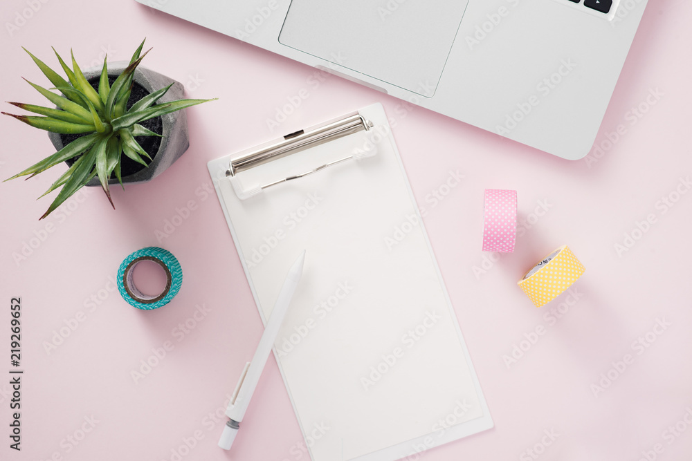 college entrance set with notebook and pen on pink desk top view mock-up college entrance set with notebook and pen on pink desk top view mock-up