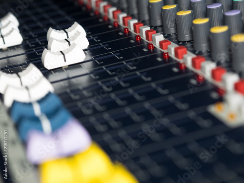 Controls on audio mixer close up