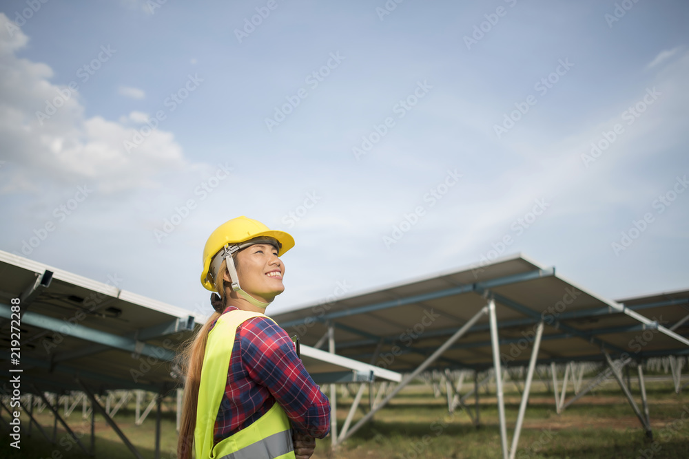 Engineer electric woman checking and maintenance of solar cells. Engineer electric woman checking and maintenance of solar cells.