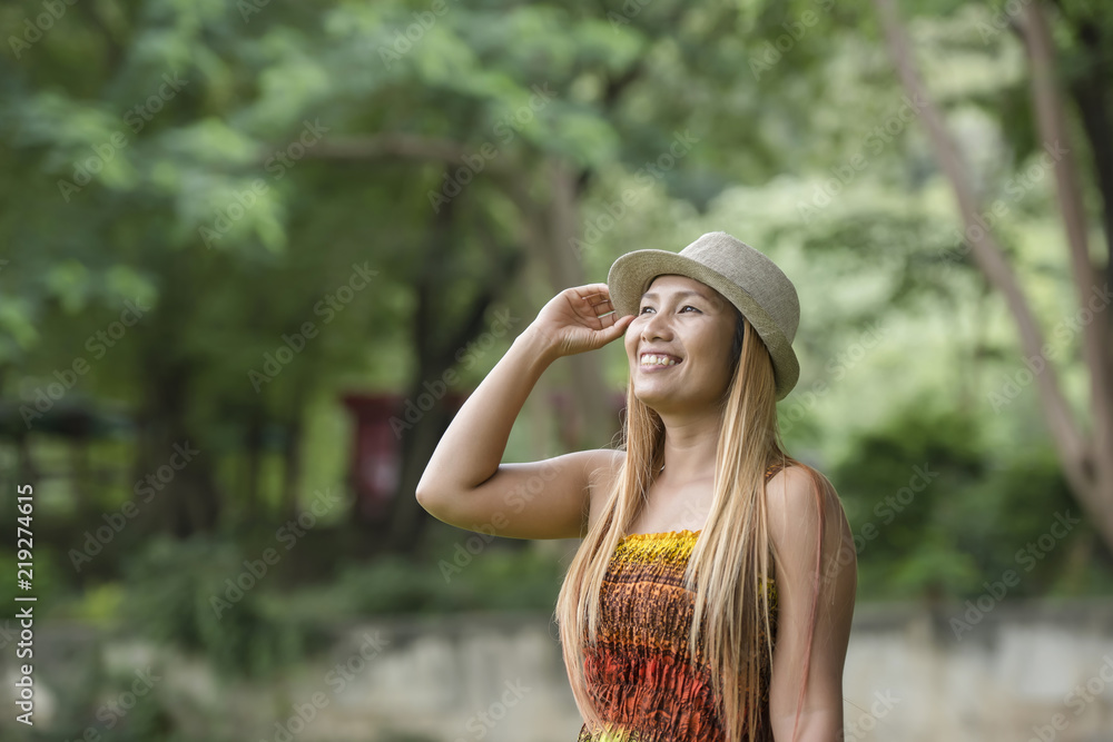 Happy Young Woman Smile And Walking In The Park