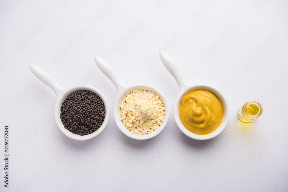 Rai or raw Mustard with sauce, powder and oil, over moody background. Selective focus
Rai or raw Mustard with sauce, powder and oil, over moody background. Selective focus
