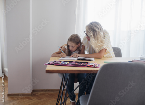 Schoolgirl Writing at Home