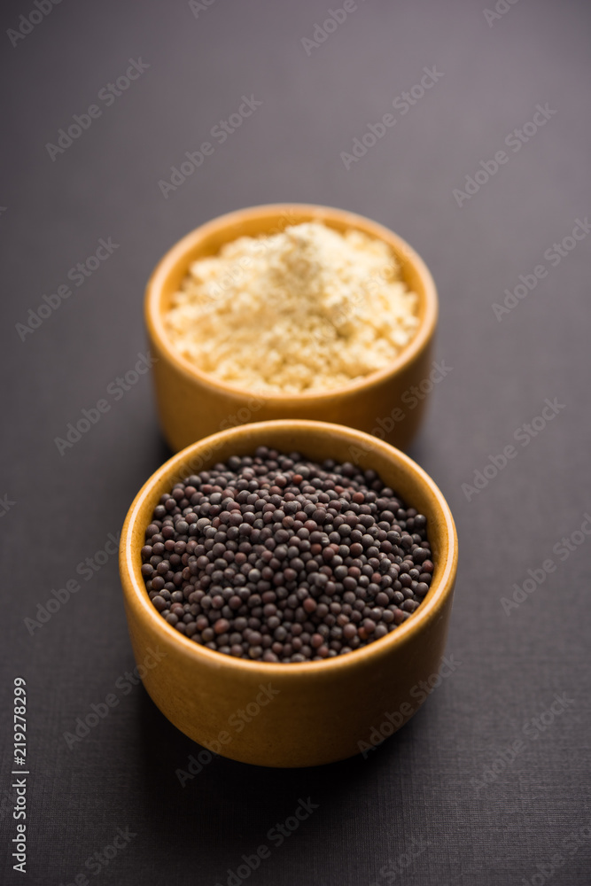 Rai or raw Mustard with sauce, powder and oil, over moody background. Selective focus
Rai or raw Mustard with sauce, powder and oil, over moody background. Selective focus