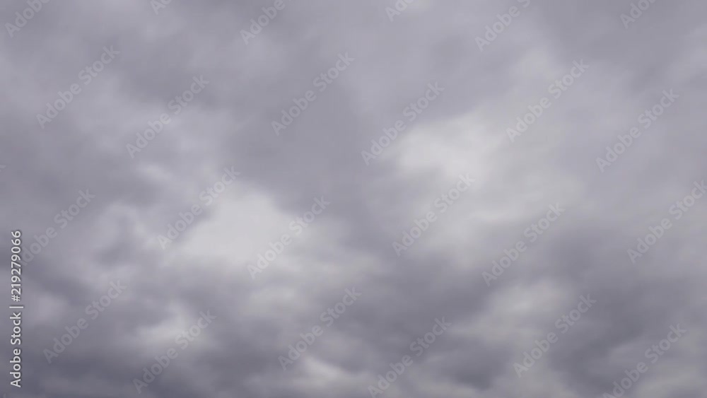 Time lapse of storm clouds changing fast and pouring rain above mountains Time lapse of storm clouds changing fast and pouring rain above mountains