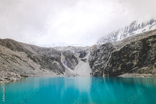 Laguna 69, Peru. Blue lake in the mountains. Winter