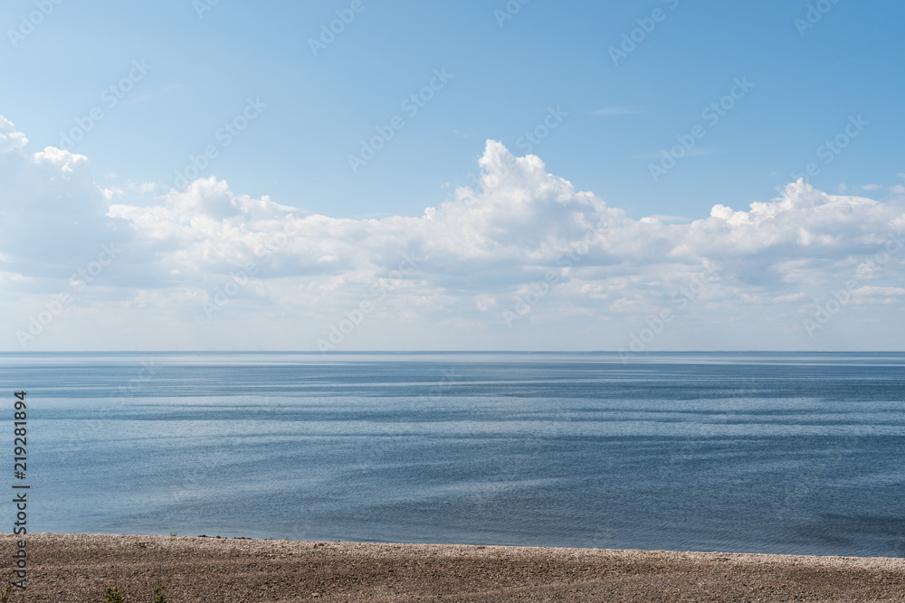 Seascape with calm water by the coast Seascape with calm water by the coast