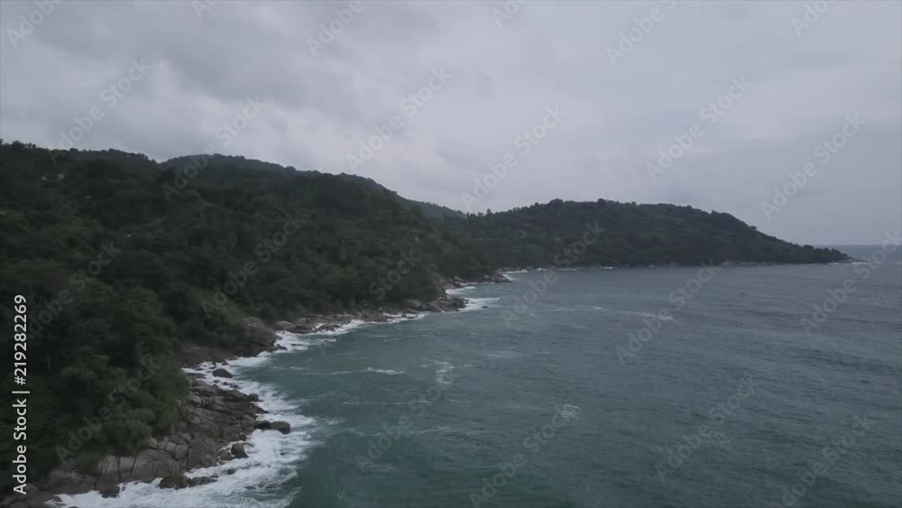 Aerial shot flying over Phuket island shore. Aerial shot flying over Phuket island shore.