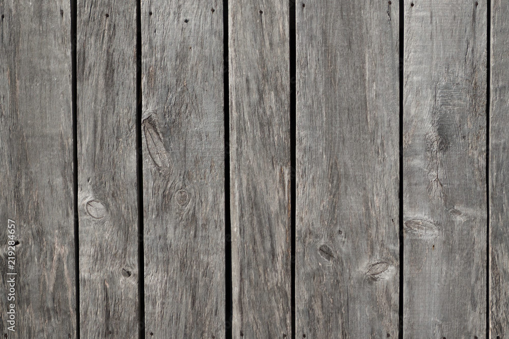 Weathered gray raw wood boards background wallpaper