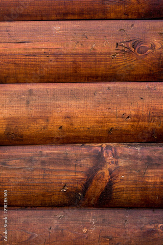 Foto Wooden wall from logs