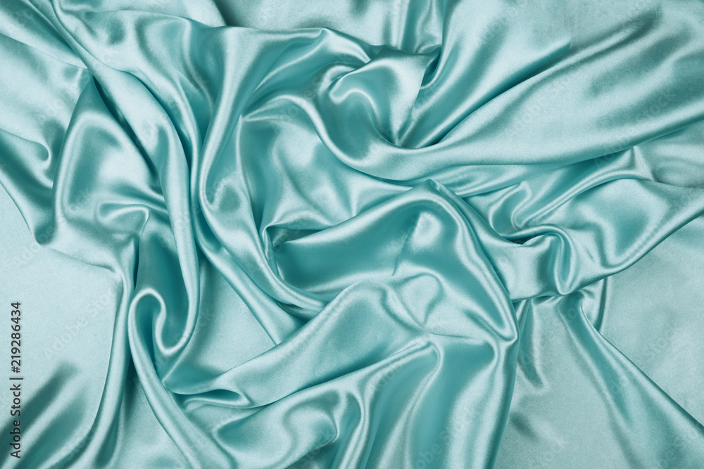 Obraz premium Green luxury satin fabric texture for background