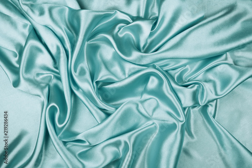 Green luxury satin fabric texture for background