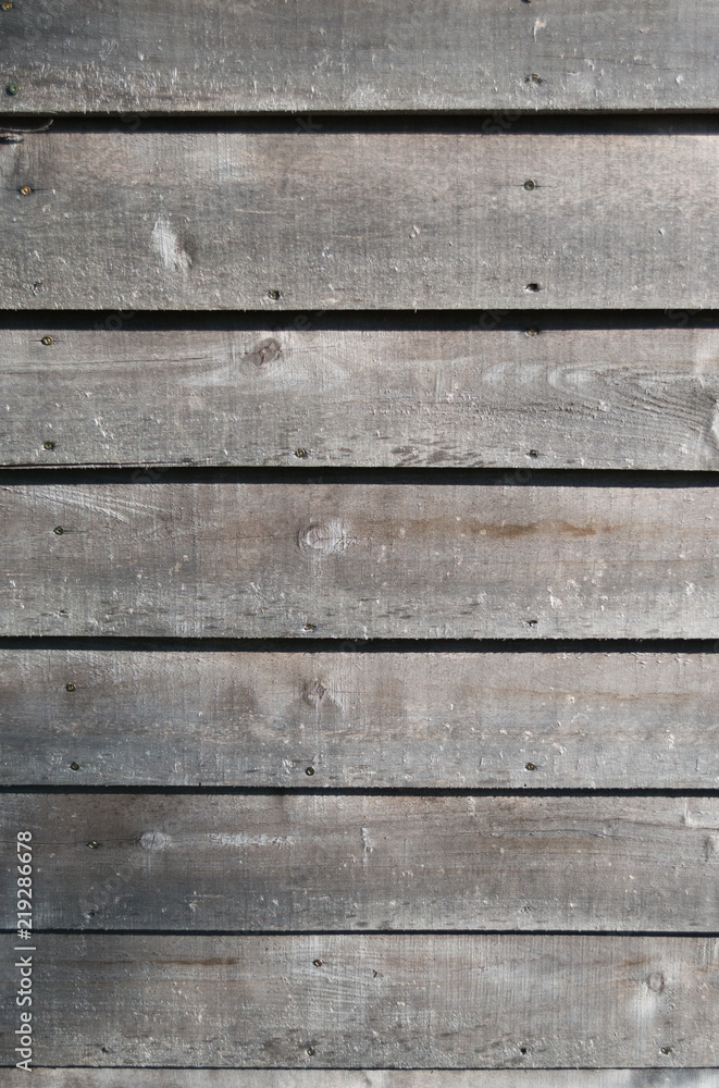 Weathered gray raw wood boards background wallpaper Weathered gray raw wood boards background wallpaper