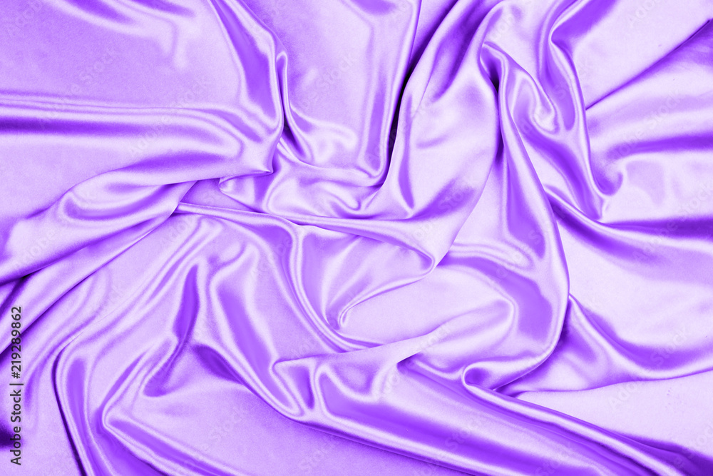 Fototapeta premium Purple luxury satin fabric texture for background
