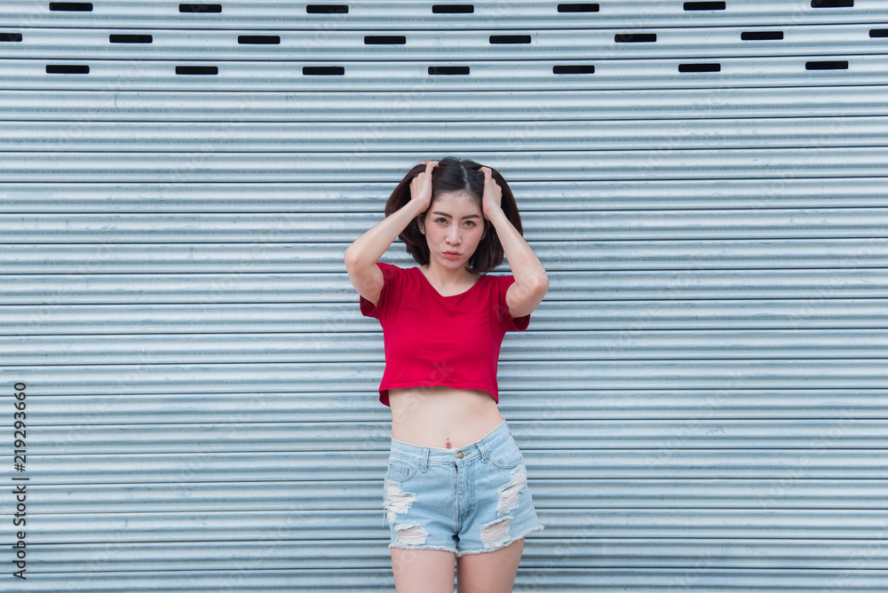 Obraz premium Portrait of asian woman sit on the road,Beautiful thailand people,Happy woman concept,Lifestyle of modern girl