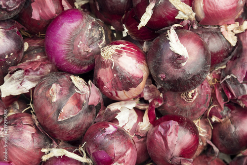 Organic red onions at local farmers market