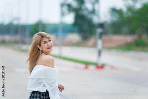 Portrait of beautiful asian woman gold hair outdoor,Happy woman concept,Lifestyle of modern girl,Thailand people © reewungjunerr