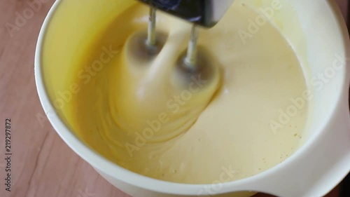 The mixer beats the eggs. Video close-up, high quality