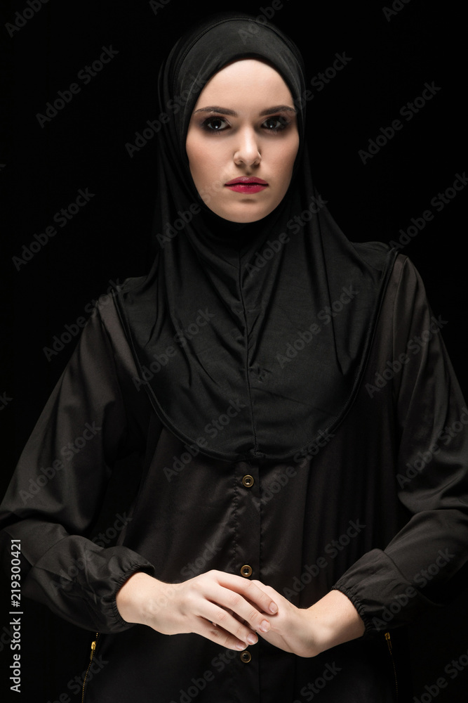 Portrait of young Muslim woman in traditional clothes