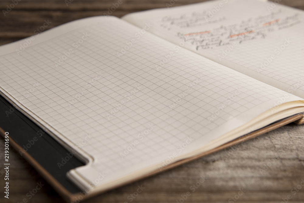 Work and time management, opened notebook over rustic, old textured wooden table. Copy space. Back to school. Work and time management, opened notebook over rustic, old textured wooden table. Copy space. Back to school.