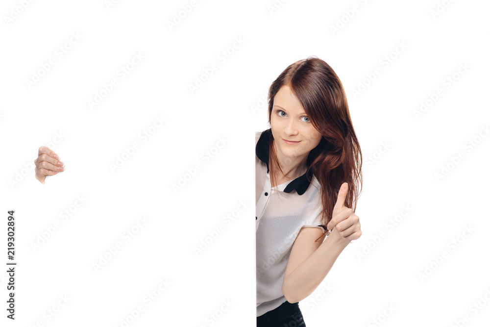 Beautiful brunette woman holding white signboard at white background Beautiful brunette woman holding white signboard at white background