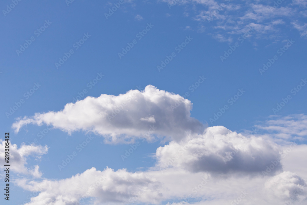 White clouds on blue sky background . Early spring White clouds on blue sky background . Early spring
