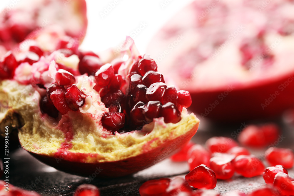 Ripe and juicy pomegranate. Red organic pomegranate.