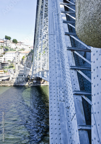 A close-up of the Dom LuÃ­s I Bridge, a double-deck steel bridge that arches across the River Douro between the cities of Porto and Vila Nova de Gaia in Portugal. photo
