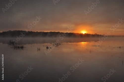 Beautiful sunrise on the river early in the morning  © Victor Lazarev