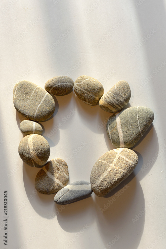 pebble stones circle on white