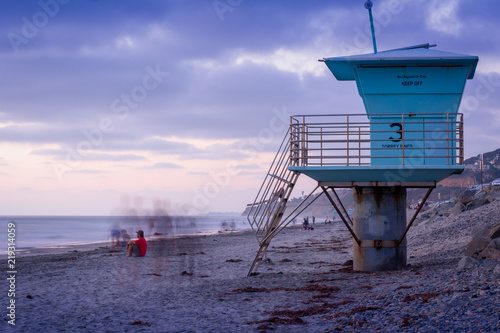 beach long exposure ghosts people relaxing
