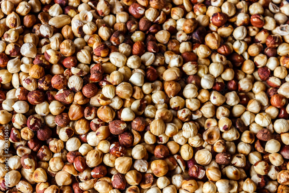 Nut background of hazelnut fruits. Food background. Top view of hazelnut nuts. Nut background of hazelnut fruits. Food background. Top view of hazelnut nuts.