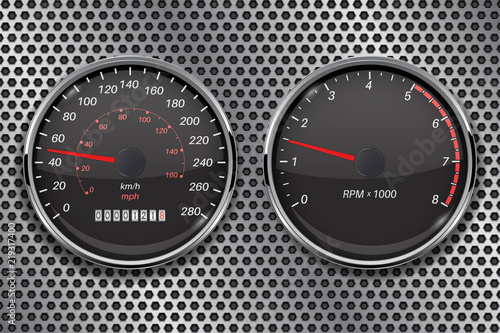 Speedometer and tachometer on metal perforated background. 50 km per hour