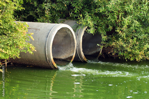Discharge of sewage into a river