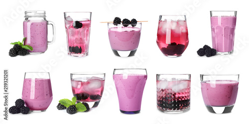 Set with different blackberry drinks on white background