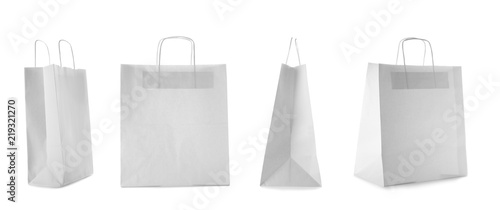 Set with shopping bags on white background