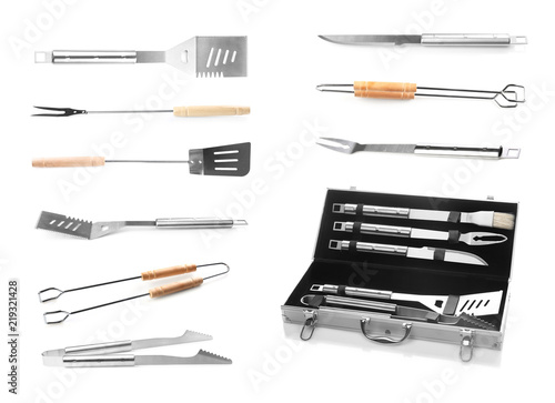 Set with barbecue utensils on white background