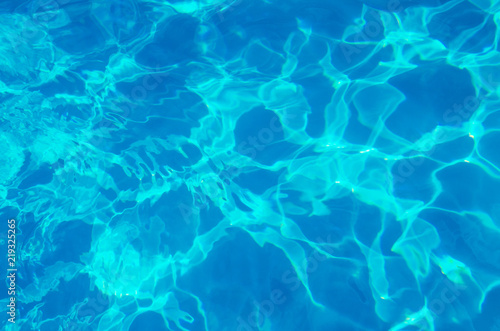 water in swimming pool rippled water detail background