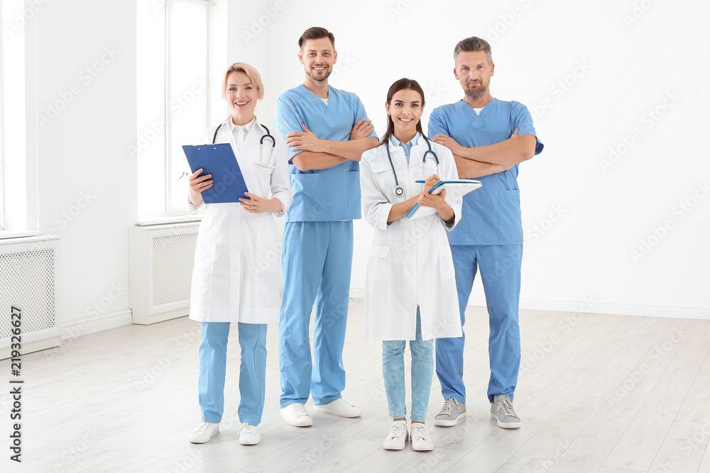 Doctors and medical assistants in clinic. Health care service Doctors and medical assistants in clinic. Health care service