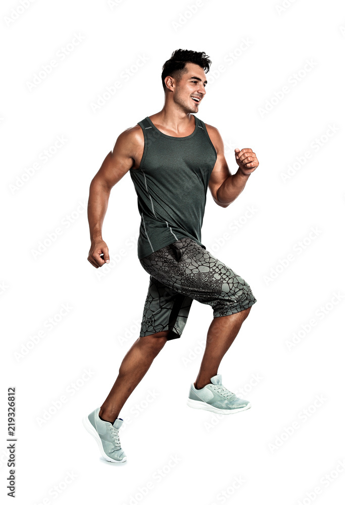 Handsome young man running on white background Handsome young man running on white background