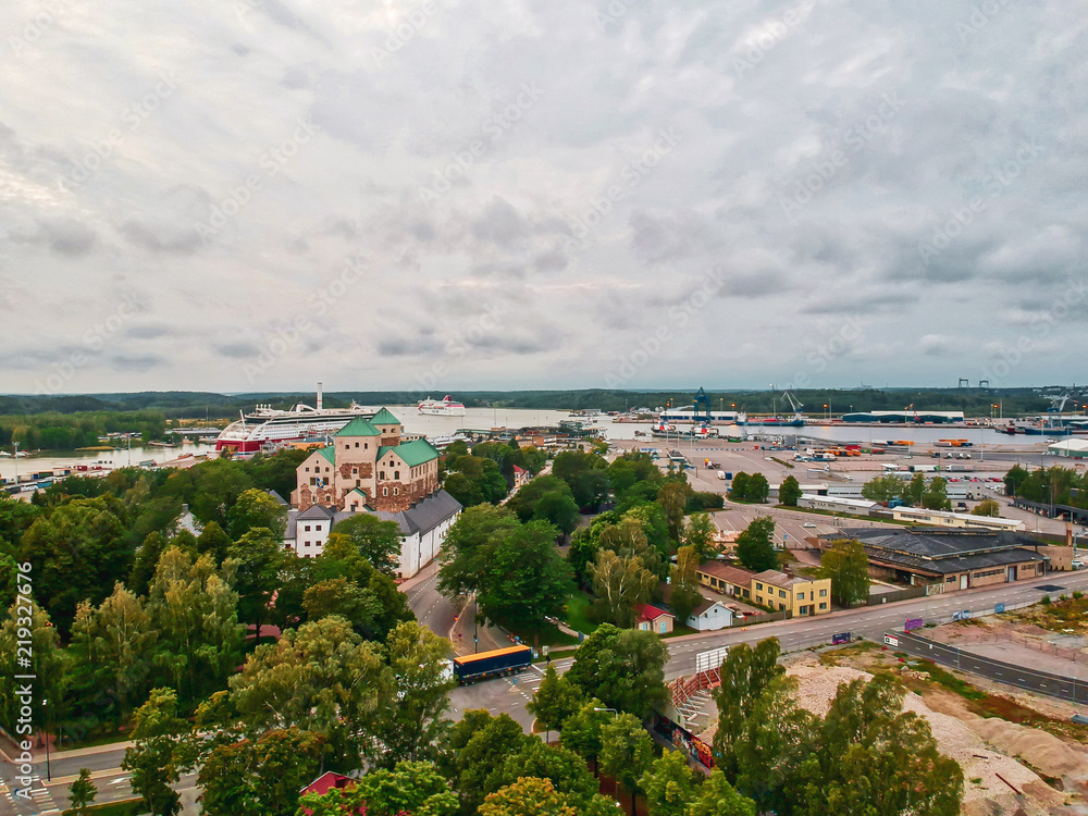 Castle of Turku and the port of Turku. Shot from the air at august.