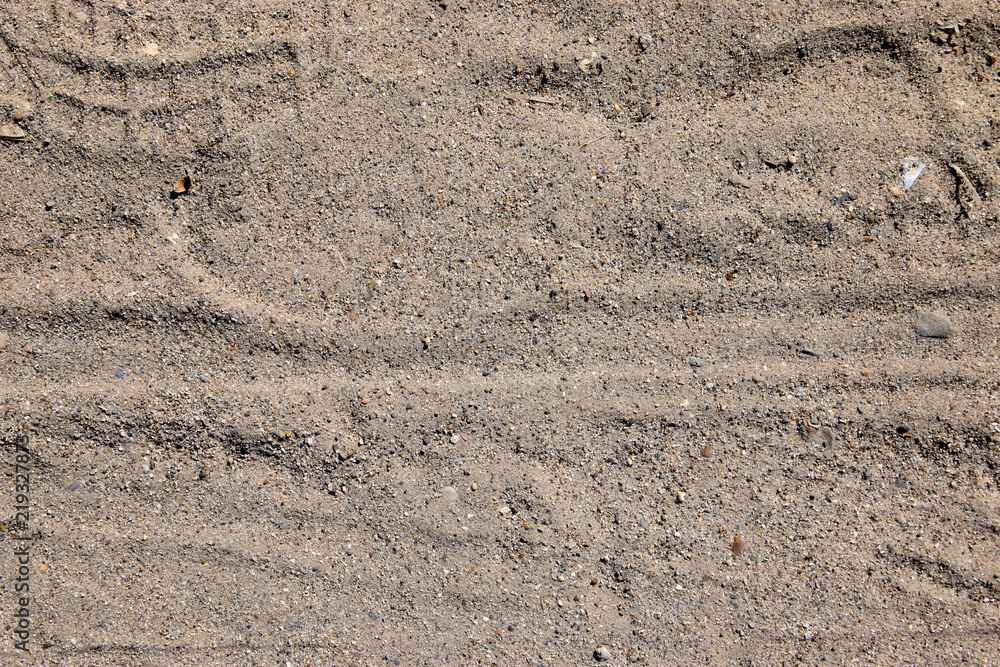 Footprint On Dark Sand With Tiny Rocks Texture Footprint On Dark Sand With Tiny Rocks Texture