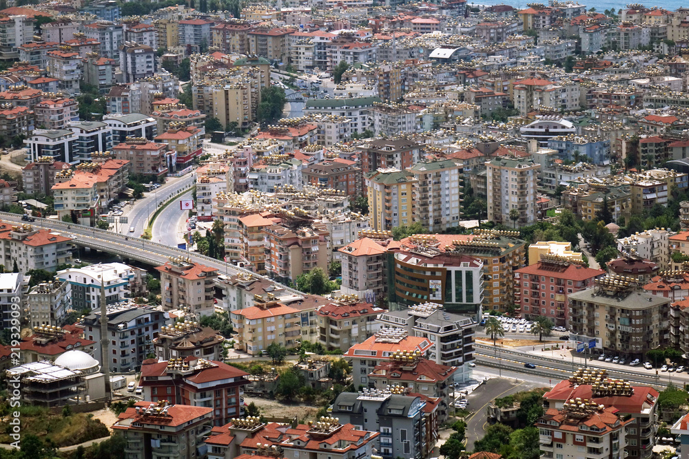  Panorama of the city. Numerous houses of the coastal city. The view from the height of bird flight.