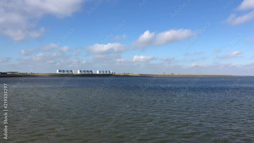 Sailing at the Wadden Sea in Friesland, The Netherlands Sailing at the Wadden Sea in Friesland, The Netherlands